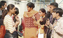 Deaf and dumb children communicate with one another at Guru Nanak Dev Stadium in Ludhiana on Saturday.
