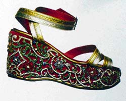 Sandal, leather with multicoloured beads. Made by Ferragamo for Maharani Indira Devi of Cooch Behar, 1938