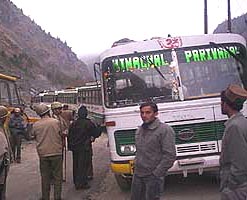 Buses stranded on the Hindustan-Tibet road that was blocked by tribal people in protest against the police firing at Karcham on Saturday.