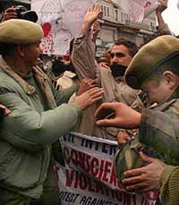 The police arrests activists of the Jammu and Kashmir Liberation Front during a protest march against the alleged human rights violations by security forces in Jammu and Kashmir on Sunday.