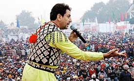 Punjabi singer Gurdas Mann performs during the 21st Annual Sports Festival at Jarkhar