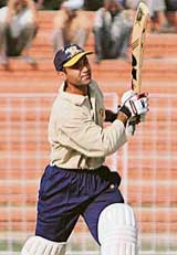 Punjab skipper Pankaj Dharmani plays a shot on the second day of the Ranji Trophy match against Mumbai at the PCA Stadium in Mohali on Sunday
