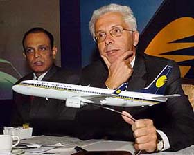 Jet Airways CEO Wolfgang Prock-Schauer with a model of Boeing 737-800 aircraft in New Delhi