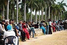 Students bask in the sun at Panjab University after Sundays rain in Chandigarh