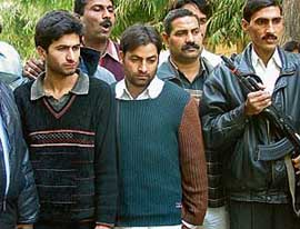 Gulzar and Mohd Amin, members of the Lashkar-e-Toiba, who were arrested by the Delhi Police Special Cell, are presented in front of the media in New Delhi on Monday. 