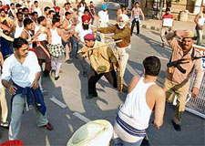 Members of the Punjab Unemployed Linemen Union being lathicharged during a protest in support of their demands near the private residence of the Punjab Chief Minister in Patiala on Monday.