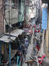 Wired: Power supply and other cables mesh the Guru Bazar area of the walled city of Amritsar