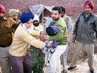 A labourer is taken to the Civil Hospital after a mishap on the Power House road in Bathinda on Tuesday.