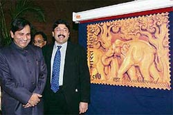 Union Communications and IT Minister Dayanidhi Maran with Minister of State Shakeel Ahmed release India's first perfumed stamp in New Delhi on Wednesday