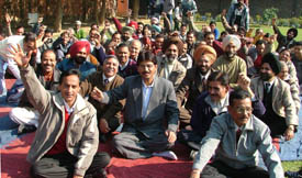 Employees of the Income Tax Department in a defiant mood in Ludhiana on Thursday