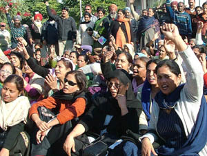 Members of the Punjab State Aided School Teachers and Other Employees Union holds a rally in front of the District Administrative Complex in Jalandhar on Friday 