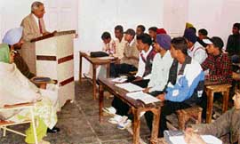 Mr Arvind Malhotra, member, Punjab School Education Board, addresses participants at a personal contact programme at Sanatan Vidya Mandir Senior Secondary School, Ahmedgarh, on Friday. 