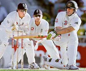 Aussie Matthew Hayden plays a sweep shot to bring up his half century during the second day of the third Ashes Test in Perth