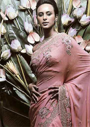 A model wearing Pallavi Jaikishans design and (Right) Bridal Asia CEO Divya Gurwara
