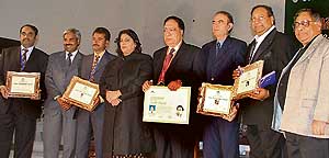 Eminent poets after award presentation at the annual Sahir Memorial Mushaira in Ludhiana on Saturday.