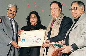 Ms Gurkanwal Kaur, Minister of State for Cultural Affairs, presents Sahir Award to Ata-ul-Qasmi in Ludhiana