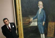 A museum employee stands next to the Retrato del Infante Don Luis de Borbony Vallabriga painting by Spanish painter Francisco de Goya at Madrids Prado Museum on Monday. The painting, which dates back to 1783, will be exhibited to the public for the first time at Zaragoza Museum.  Reuters