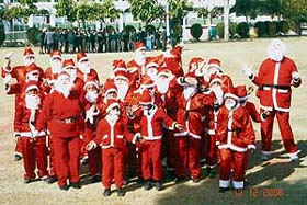 Students of St Xaviers dressed as Santa Claus