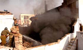 Firemen at the site of an inferno at a plastic godown in Sita Ram Bazar, Chandni Chowk, in the Capital on Tuesday. 
