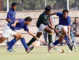 A hockey match in progress between Jamia Millia Islamia University, Delhi, and Guru Nanak Dev University, Amritsar, during the 44th North Zone Inter-varsity Hockey Tournament at PAU campus, Ludhiana, on Tuesday