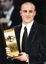 Fabio Cannavaro of Italy with his World Player of the Year trophy in Zurich on Monday