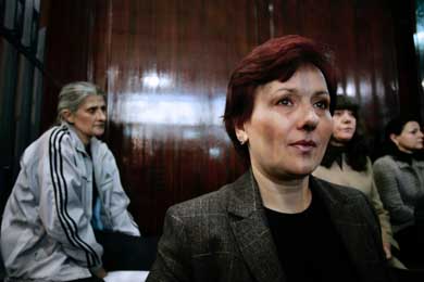 Bulgarian nurses Valia Cherveniashka, Christiana Valcheva, Nasya Nenova and Valentina Siropoulo wait for the verdict in a court in Tripoli on Tuesday. A Libyan court sentenced five Bulgarian nurses and a Palestinian doctor to death for deliberately infecting hundreds of children with the virus that causes AIDS