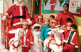 Students of Children Valley School celebrate Christmas with Santa Claus at a function in Ludhiana on Wednesday