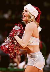 A member of the Milwaukee Bucks dance team performs during a basketball game against Miami Heat at the Bradley Centre in Milwaukee, Wisconsin, on Wednesday