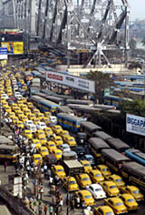 Traffic comes to a standstill at the Howrah bridge in Kolkata on Friday after Trinamool Congress activists blocked the road protesting against the acquisition of agricultural land in Singur by the state government for Tata Motors.