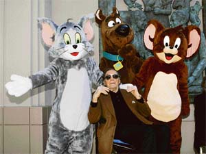 Joseph Barbera, a co-founder of the Hanna-Barbera cartoon company, with three of the legendary characters Scooby-Doo (centre), Tom and Jerry (right)