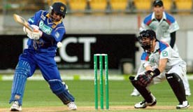 Sri Lankas Sanath Jayasuriya plays a shot as New Zealand wicketkeeper Peter McGlashan looks on during the Twenty20 match at Westpac Stadium, Wellington, on Friday.