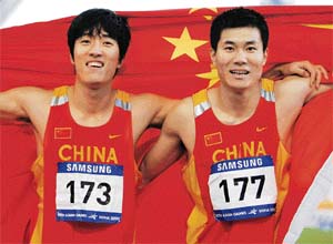 World record holder Liu Xiang (left) and silver medallist Shi Dongpeng expectedly made it a one-two for China in the mens 110m hurdles at the Asiad