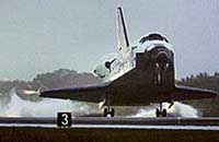 US Space Shuttle Discovery lands on Friday at the Kennedy Space Centre, Florida.