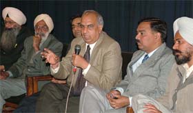 Mr R.K. Gupta answers a query during a seminar in Jalandhar
