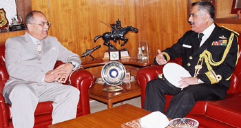 Pakistans Secretary Defence Tariq Waseem Ghazi (L) talks to Indias Rear Admiral and Chief Naval Hydrographer B.R. Rao during a meeting at the Defense Ministry in Rawalpindi on Saturday.