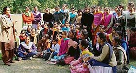 NSS volunteers (Girls wing) of SCD Govt College attend a camp at Daad village