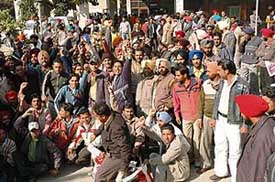 Multipurpose health workers hailing from Punjab protest outside the office of the Punjab Health Department in Sector 34, Chandigarh, on Monday