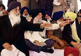 Parkash Singh Badal and Capt Kanwaljit Singh gesture at the Jor Mela at Fatehgarh Sahib on Monday.