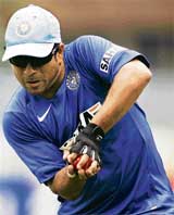 Sachin Tendulkar takes a catch during a practice session in Durban on Monday