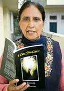 Ms Baljit Amarjit Singh with her book at her residence in Sector 36, Chandigarh, on Wednesday. 