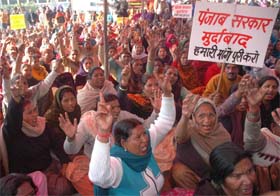Safai workers hold a rally on the second day of their protest to press for the acceptance of demands, in front of the MCs office, jalandhar, on Wednesday. 