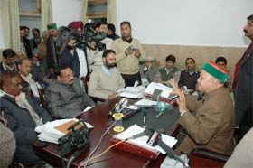 Chief Minister Virbhadra Singh addresses mediapersons after Cabinet meeting in Dharamsala
