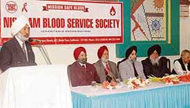Dr M.S. Walia addresses the annual day function of the Nishkam Blood Service Society in Ludhiana on Thursday