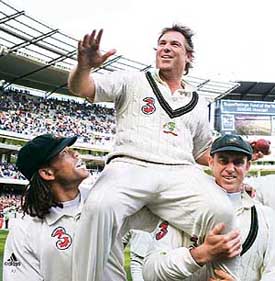Australias Shane Warne is carried by team-mates Andrew Symonds (left) and Matthew Hayden after winning the fourth Ashes Test against England at the Melbourne Cricket Ground on Thursday. 