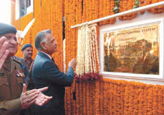 Union Home Minister Shivraj Patil inaugurating a new traffic monitoring system as Delhi Police Commissioner K. K. Paul looks on.  Tribune photo by Rajeev Tyagi