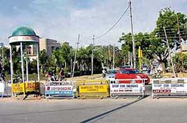 Barricades installed to block the entry between Sectors 7 and 8 in Panchkula on Sunday.