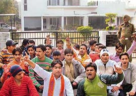 Activists of the Bajrang Dal raise slogans outside the residence of Mohinder Singh in Sector 27, Chandigarh, on Sunday.