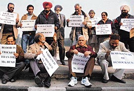 Panjab University senators and teachers stage a protest against the execution of Saddam Hussein in the university on Sunday.