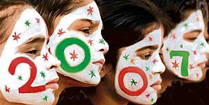Girls welcome the New Year in Amritsar on Sunday.