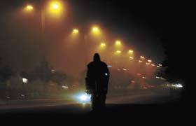A thick blanket of fog envelopes Delhi forcing the authorities to switch on the streetlights in the afternoon itself